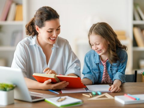 Girl doing homework or online education.