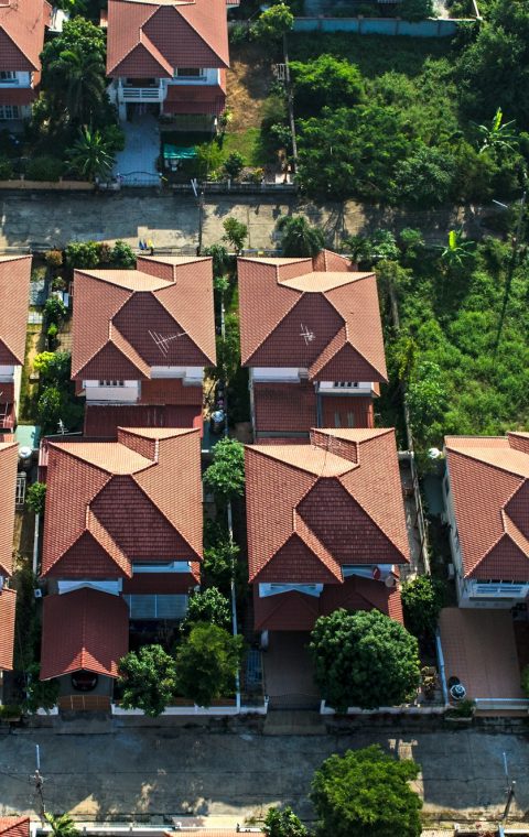 Red roofs in residential area housing, view from the air